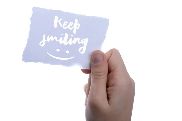 Beyaz Arkaplanda Kağıt Üzerinde Gülümsemeye Devam — Stok fotoğraf