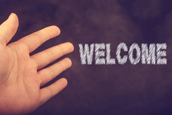 Hand making a welcome gesture — Stock Photo, Image