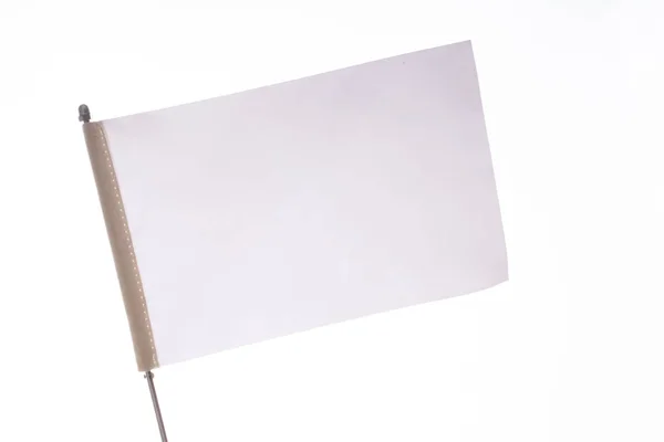 Bílý praporek na bílém pozadí na displeji — Stock fotografie