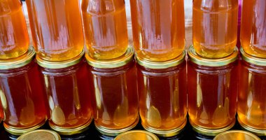 Cam kavanoz kapağı closeup ile ayarla bal 