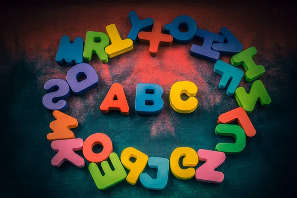 Cartas ABC coloridas feitas de madeira — Fotografia de Stock