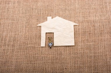 Adam heykelcik ve bir ev şekil dışarı-in kağıt kesme 