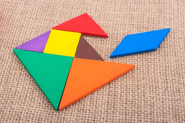 Bir kare tangram bulmacanın parçaları