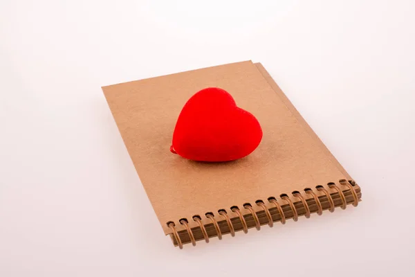 Corazón en el cuaderno — Foto de Stock