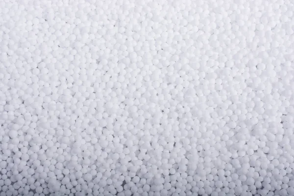 白色小聚苯乙烯泡沫球作为背景 — 图库照片