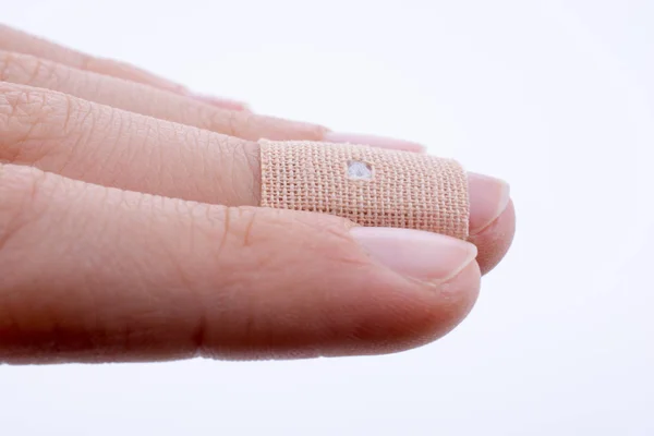 Finger Weißem Verband Auf Weißem Hintergrund — Stockfoto