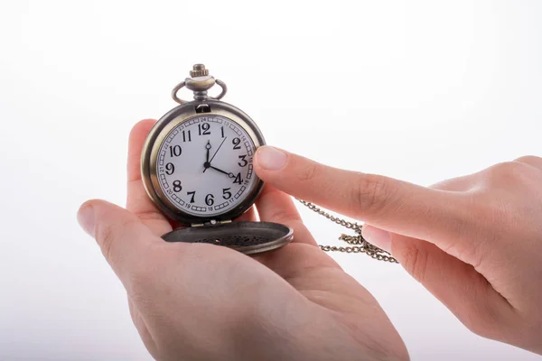 Zak horloge in de hand Rechtenvrije Stockfoto's