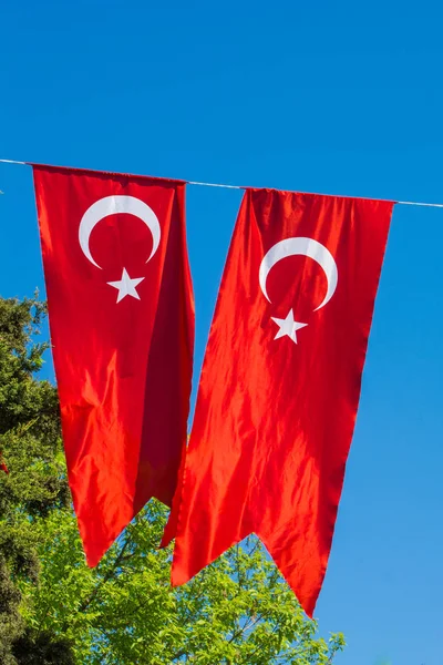 Turkish national flag hang in view in the open air