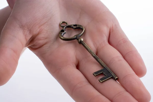 Klíč v ruce — Stock fotografie