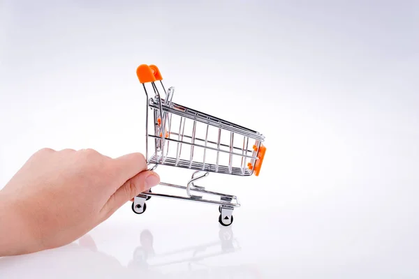 Hand Holding Cart White Background — 스톡 사진