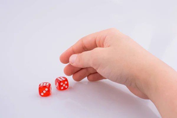 Hand holding red dice — Stock Photo, Image