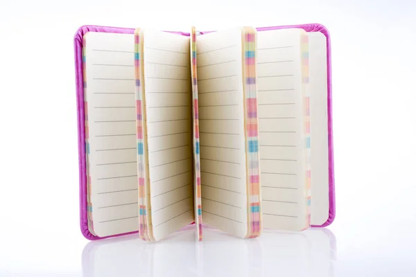 Pembe notebook — Stok fotoğraf