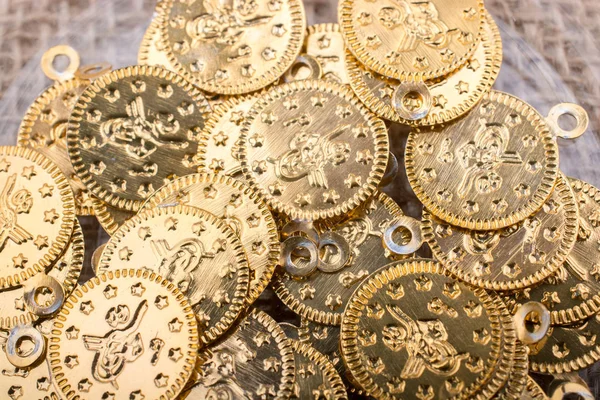 Plenty of fake gold coins are in the view