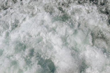 Köpük ve kabarcıklar ile su yüzey arka plan