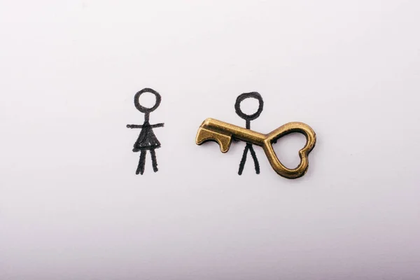 Mężczyzna, Kobieta i klucz w stylu retro jako koncepcja miłości — Zdjęcie stockowe