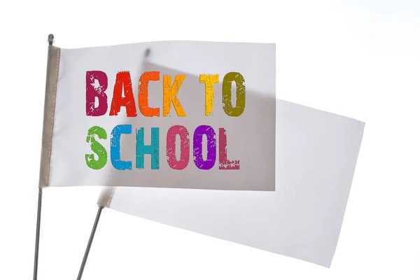 Two white flags on a white background in display — Stock Photo, Image