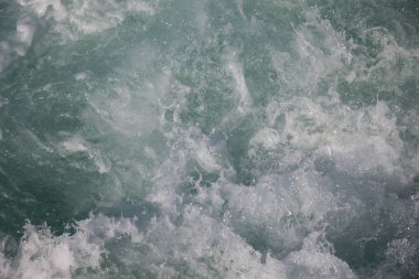 Köpük ve kabarcıklar ile su yüzey arka plan