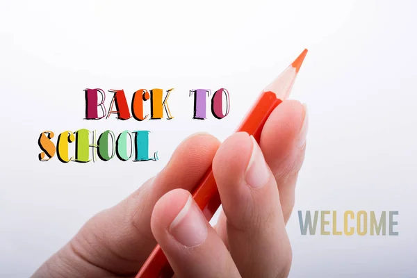 Hand holding pencil — Stock Photo, Image