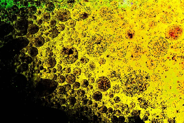 Makro strzał pęcherzyki oleju na kolorowym tle — Zdjęcie stockowe