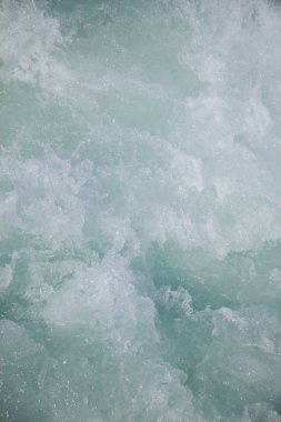 Köpük ve kabarcıklar ile su yüzey arka plan