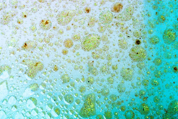 Macro colpo di bolle di olio su sfondo colorato — Foto Stock