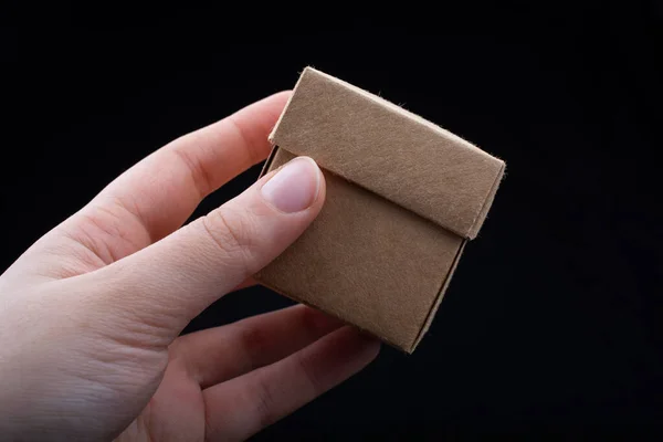 Hand Holding Brown Cardboard Box Black Backgrounds — Stock Photo, Image