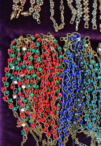 Various colorful beads in the market. Necklace of colorful beads