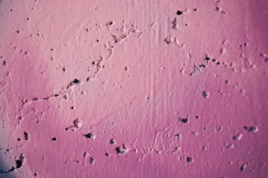 Soyut arkaplan dokusu olarak çeşitli renklere boyanmış duvar yüzeyi