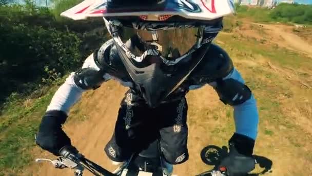 Biker jumps on a motorcycle, close up. POV action camera shot. — Stock Video