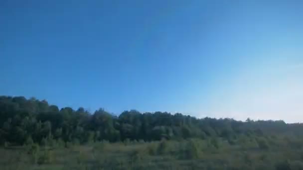 Paisaje desde una ventana de tren . — Vídeo de stock