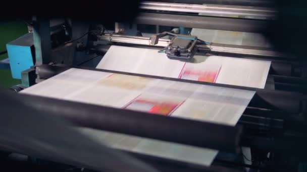 Newspaper printed on a printing house machine. — Stock Video