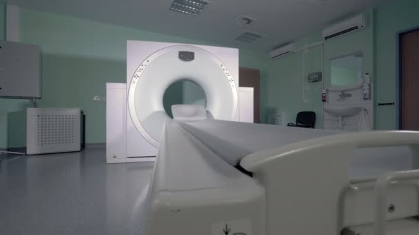 Hospital room with a switched off MRI scanning machine — Stock Video