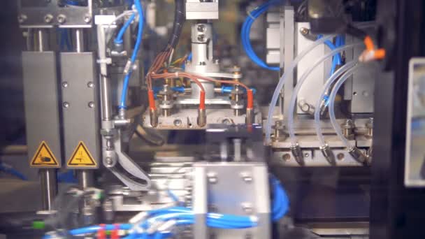 Automated factory equipment works. Special machines make little solar panels. — Stock Video