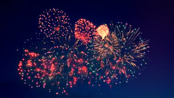 Golden fireworks are bursting in the dark sky. Stock Video