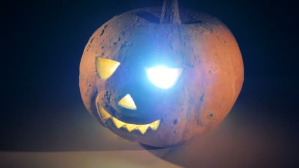Jack-o-lantern is being illuminated from the inside — Stock Video