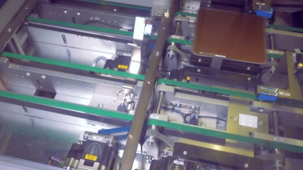 Movement of solar elements on the conveyor belt. — Stock Video