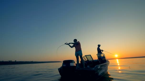 Men with a boat on a fishing trip, close up. — Stock Video