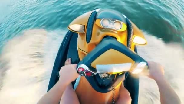 Male hands are holding a steering wheel of a waverunner in action — Stock Video