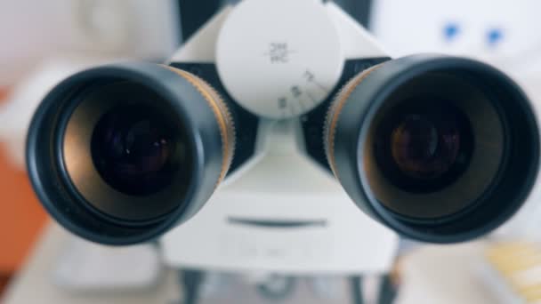 Close up of two oculars of a microscope — Stock Video