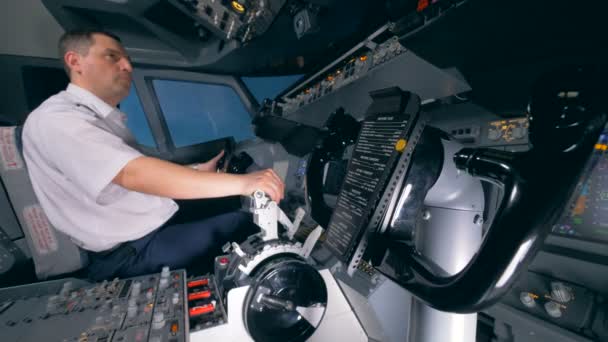 Steering wheel on in a flight simulator, close up. — Stock Video