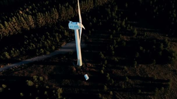 View from above of a revolving wind turbine. Wind energy, wind electricity generation concept. — Stock Video