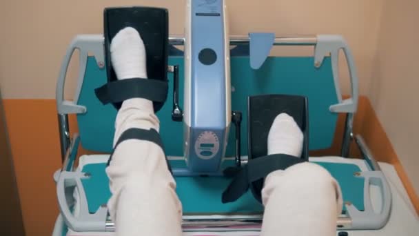 Woman trains legs on a special device, close up. — Stock Video