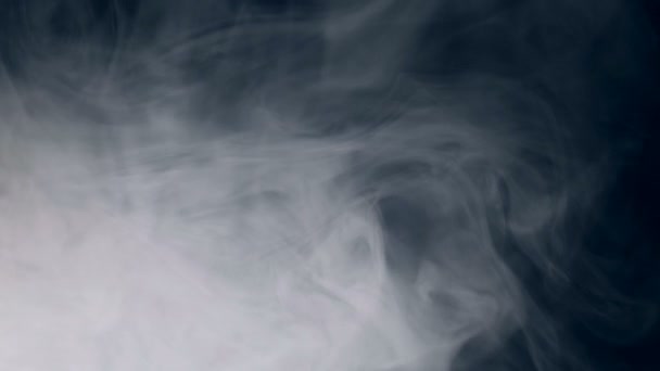 Smoke, cloud on a dark background. — Stock Video