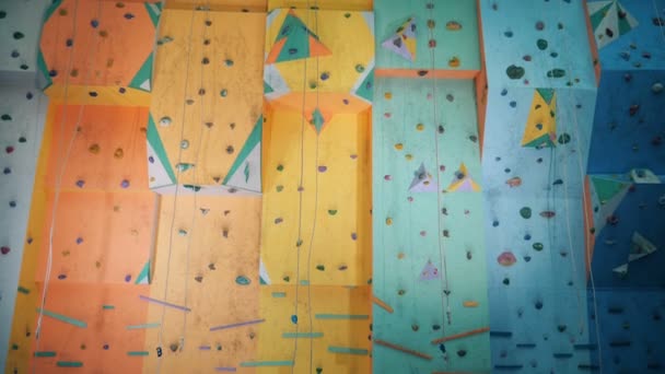 Large simulation bouldering wall in a climbing gym — Stock Video