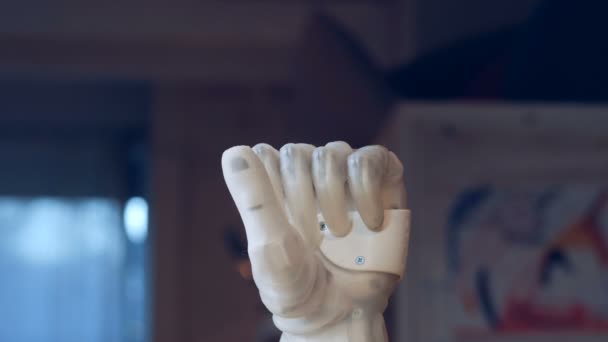 Robotic hand bending fingers, close up. — Stock Video