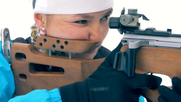 Sportswoman is aiming from a firearm — Stock Video