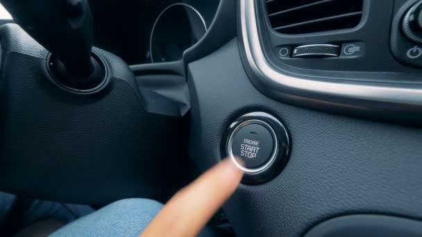 Car starting button pressed, close up. — Stock Video