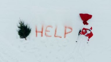 Kar yer ile onları ve Noel Baba ağlıyor yazılı yardım etmek