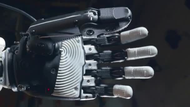 Artificial intelligence concept. Cyborg hand moves fingers, robotic equipment. — Stock Video