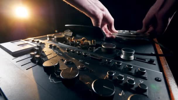 Spools are being set on the reel-to-reel recorder — Stock Video
